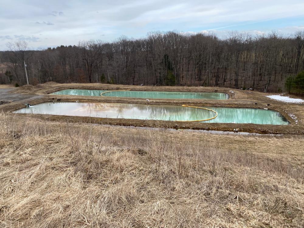 "An acid-mine sludge pond in central Pennsylvania. A byproduct of coal-mining, such sites may be rich with critical minerals.  Credit: Sarma Pisupati. All Rights Reserved."