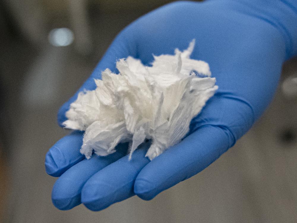 "Amir Sheikhi transforms waste products like shredded paper into nanoparticles capable of extracting critical minerals from the environment. Credit: Patrick Mansell. All Rights Reserved."