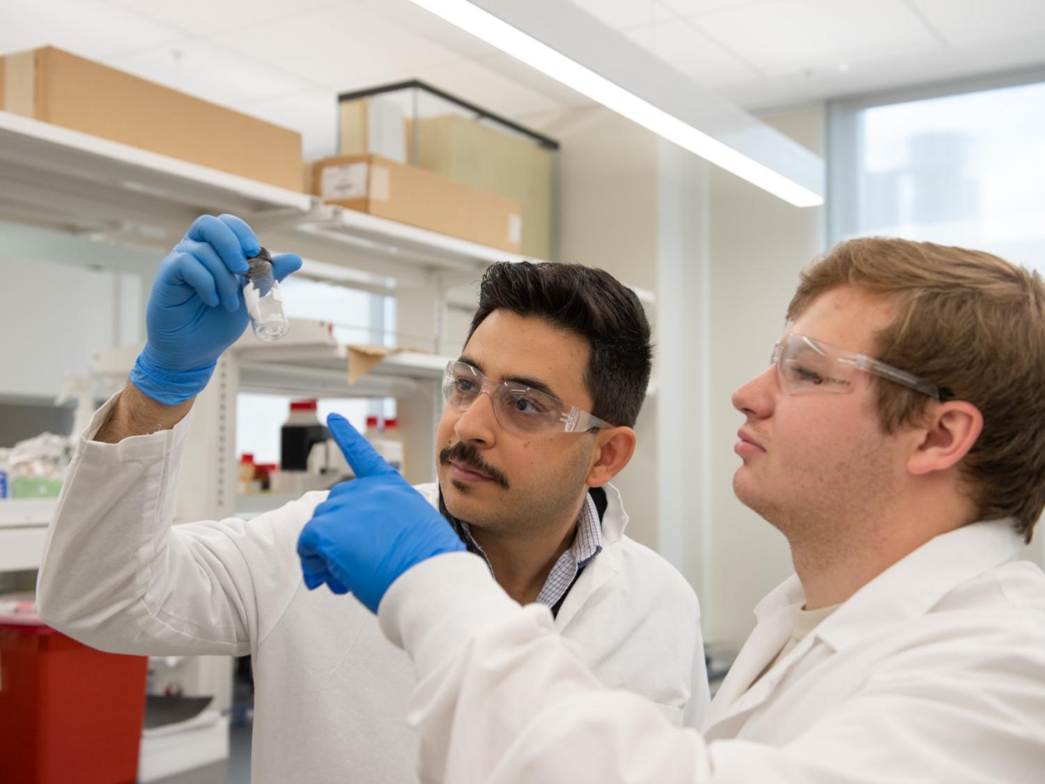 Amir Sheikhi, assistant professor of chemical engineering and of biomedical engineering, by courtesy (left) and Dawson Alexander, an undergraduate researcher from the Sheikhi Research Group, who was a co-author along with Sheikhi of the paper published in ACS Applied Materials and Interfaces.  Credit: Sheikhi Research Group. All Rights Reserved.